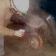 The rear drum brakes are locking up and getting very hot.